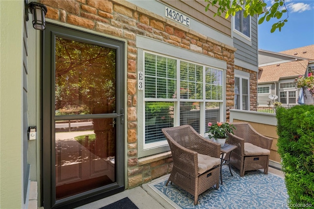 14300 Waterside Ln Unit E3, Broomfield, CO 80023 - doorway to property with stone siding