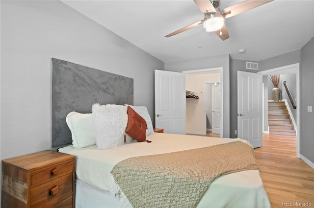 14300 Waterside Ln Unit E3, Broomfield, CO 80023 - bedroom featuring wood finished floors and a ceiling fan
