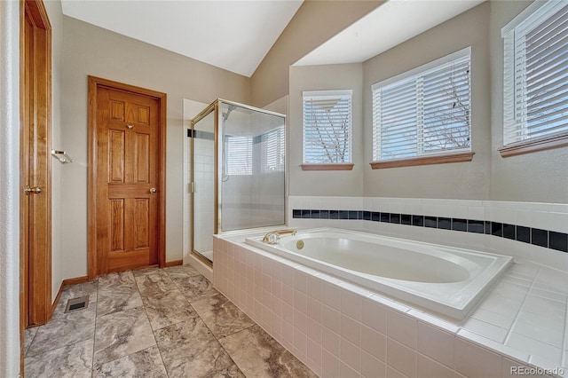 full bath with a stall shower, baseboards, visible vents, lofted ceiling, and a bath