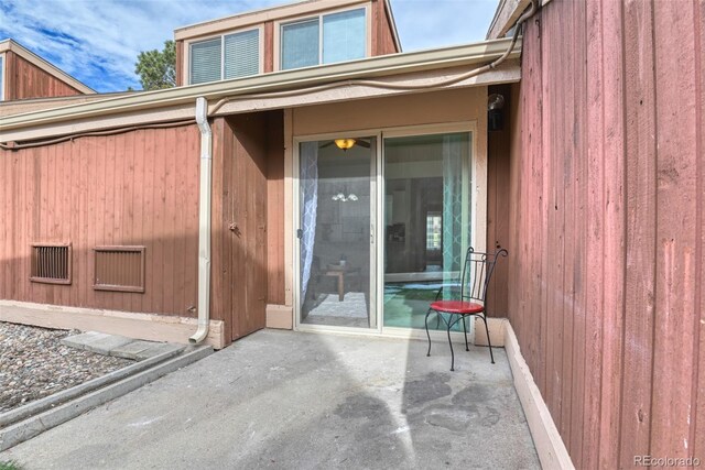 property entrance with a patio area