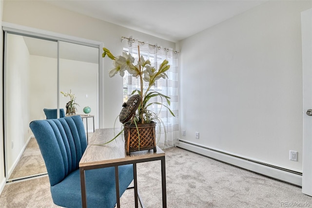 carpeted home office with a baseboard heating unit