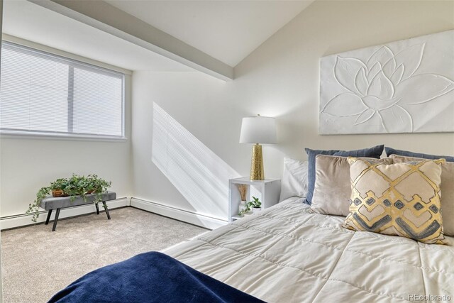 carpeted bedroom with lofted ceiling and baseboard heating