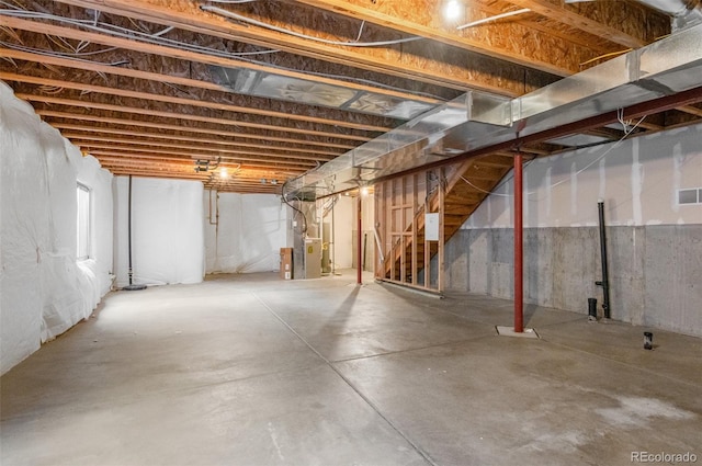 basement featuring heating unit