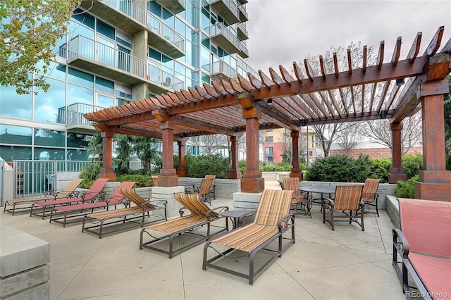 1700 Bassett St Unit 2315, Denver, CO 80202 - view of patio / terrace featuring a pergola and outdoor dining space