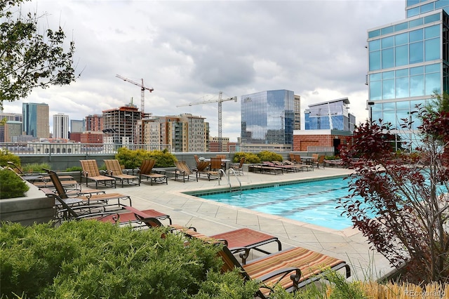 1700 Bassett St Unit 2315, Denver, CO 80202 - community pool featuring a view of city and a patio