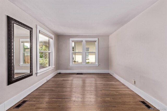 4654 Bryant St, Denver, CO 80211 - unfurnished room with dark wood-style flooring