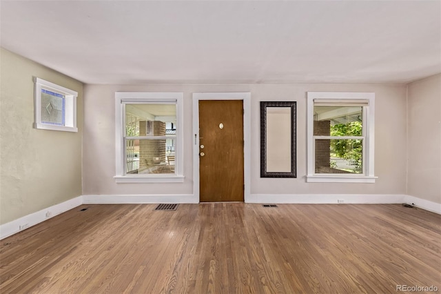 4654 Bryant St, Denver, CO 80211 - spare room featuring wood finished floors and baseboards