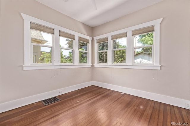 4654 Bryant St, Denver, CO 80211 - empty room featuring baseboards and dark wood-type flooring