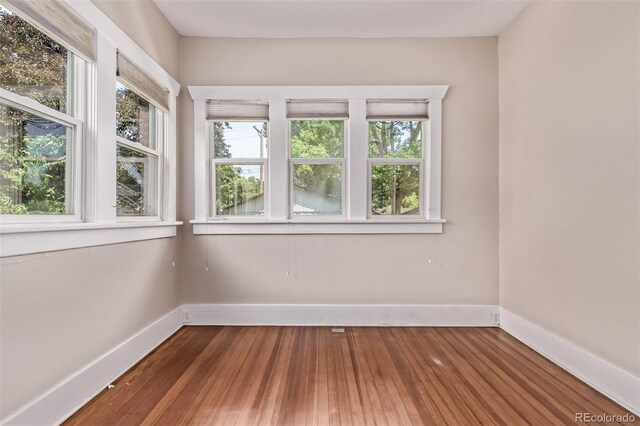 4654 Bryant St, Denver, CO 80211 - unfurnished room with hardwood / wood-style floors and baseboards
