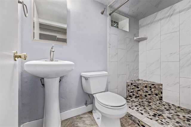 4654 Bryant St, Denver, CO 80211 - bathroom featuring toilet and tiled shower