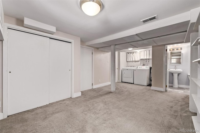 4654 Bryant St, Denver, CO 80211 - finished basement featuring washer and dryer and light colored carpet