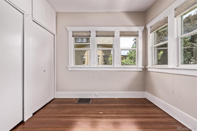 4654 Bryant St, Denver, CO 80211 - unfurnished bedroom featuring dark wood-style flooring and a closet