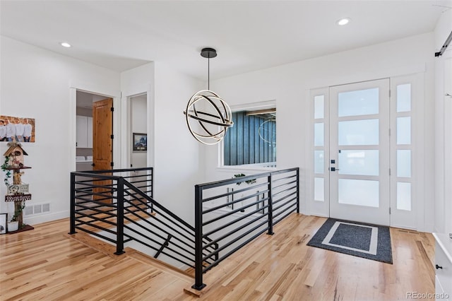 740 W County Road 10e, Berthoud, CO 80513 - foyer with baseboards, recessed lighting, wood finished floors, and visible vents