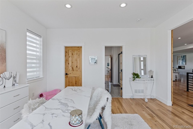 740 W County Road 10e, Berthoud, CO 80513 - bedroom with light wood-style floors, baseboards, recessed lighting, and visible vents