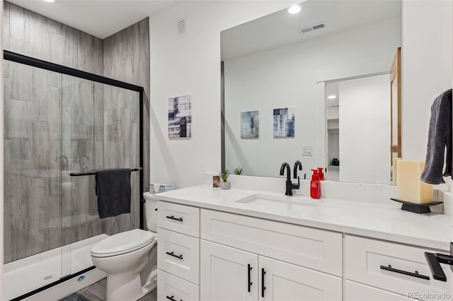 740 W County Road 10e, Berthoud, CO 80513 - bathroom featuring toilet, visible vents, and a stall shower