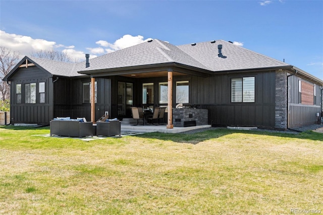 740 W County Road 10e, Berthoud, CO 80513 - rear view of house with a patio, a shingled roof, board and batten siding, and a lawn