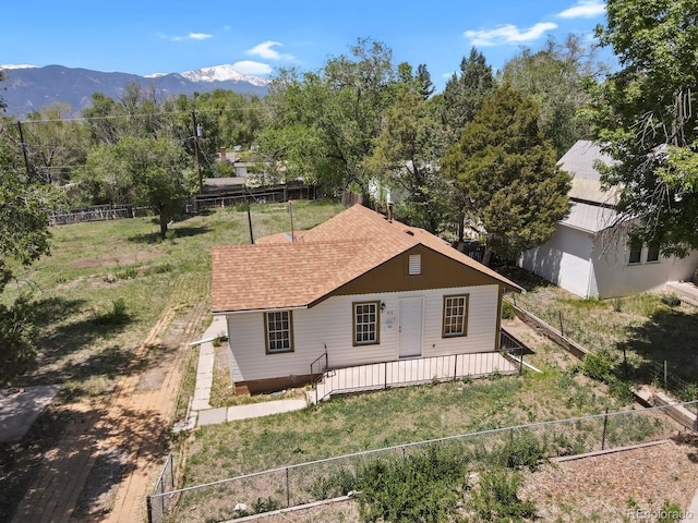 back of house featuring a mountain view