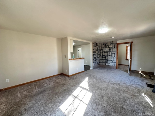 unfurnished living room with carpet