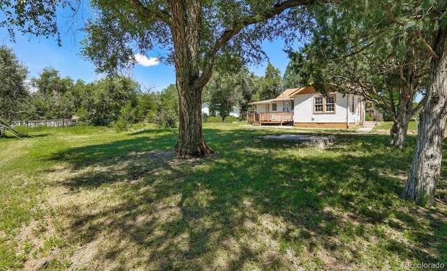 view of yard featuring a deck