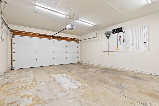 garage featuring a garage door opener