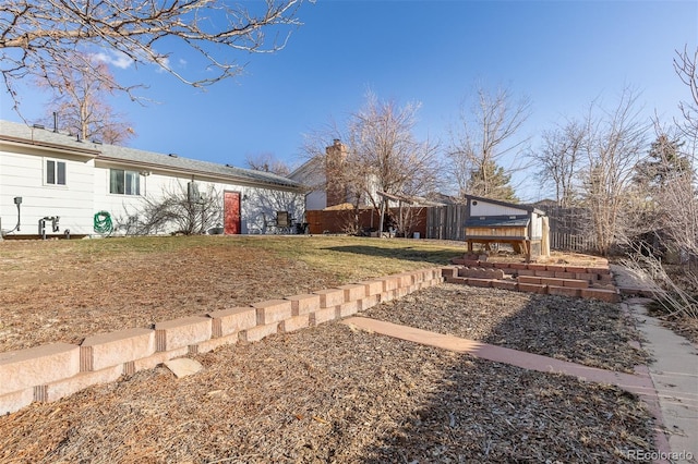 view of yard featuring fence