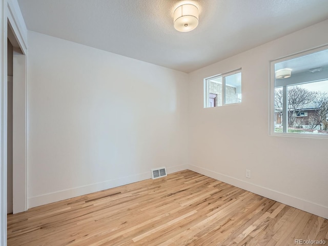 empty room featuring light hardwood / wood-style flooring