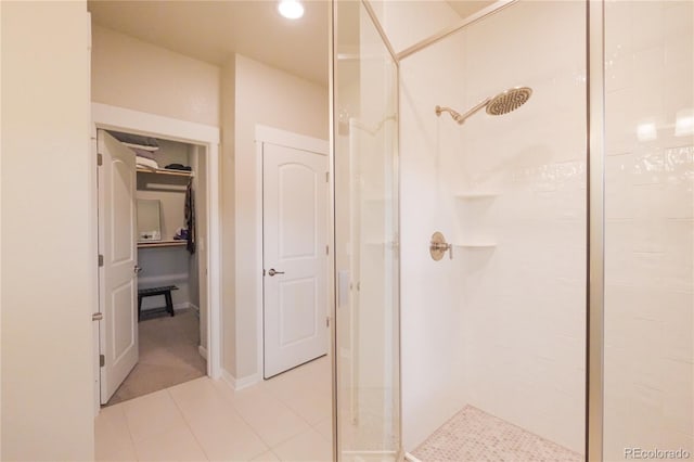 1919 W 165th Way, Broomfield, CO 80023 - bathroom with a stall shower, tile patterned floors, a walk in closet, and recessed lighting