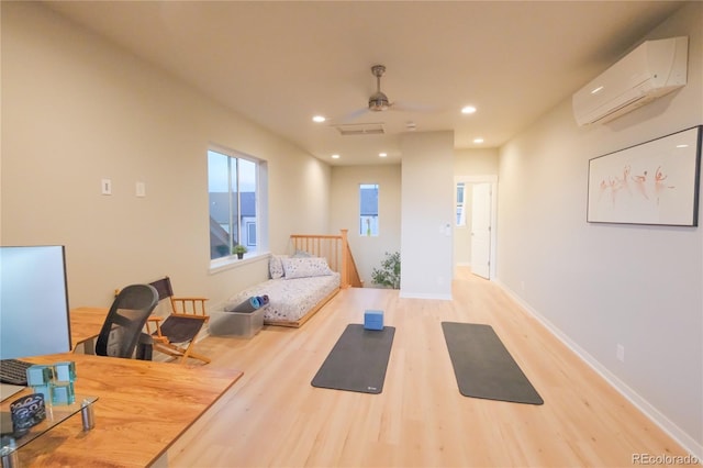 1919 W 165th Way, Broomfield, CO 80023 - exercise area featuring a wall mounted air conditioner, light wood-style floors, recessed lighting, and ceiling fan