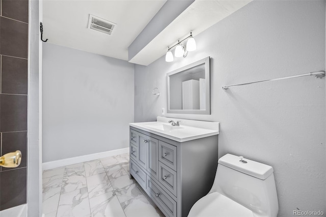 7495 E Quincy Ave Unit 208, Denver, CO 80237 - bathroom featuring marble look tiles and vanity