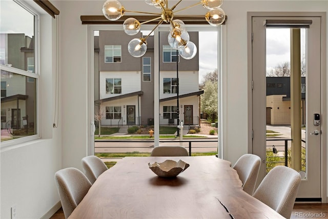 4035 Fenton Ct, Wheat Ridge, CO 80212 - dining space featuring a chandelier