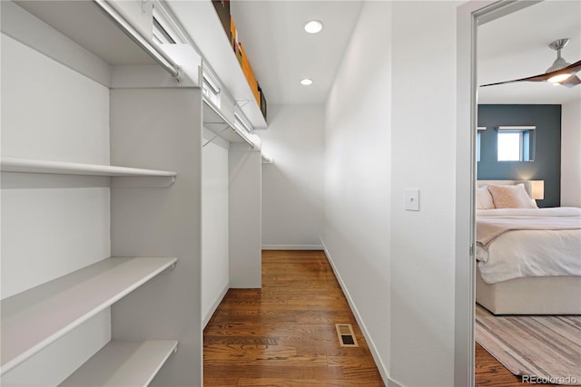 4035 Fenton Ct, Wheat Ridge, CO 80212 - walk in closet featuring wood finished floors