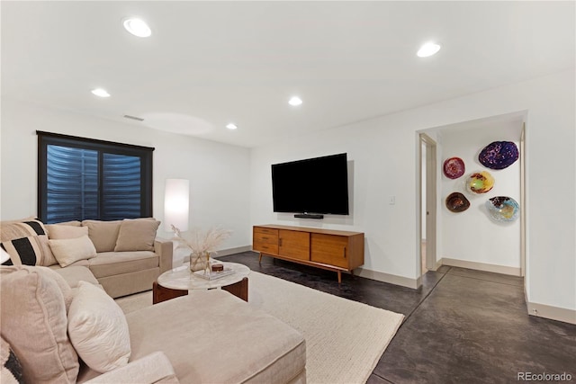 4035 Fenton Ct, Wheat Ridge, CO 80212 - living room with baseboards, concrete floors, and recessed lighting