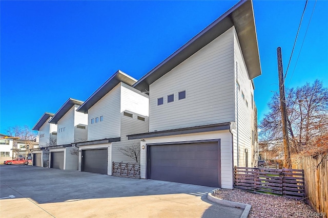 4035 Fenton Ct, Wheat Ridge, CO 80212 - view of property exterior featuring a garage and driveway