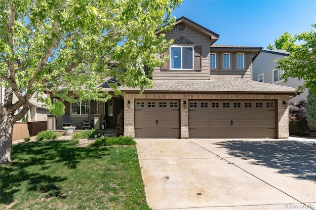 3791 Charterwood Cir, Highlands Ranch, CO 80126 - traditional-style house featuring concrete driveway, a garage, and brick siding