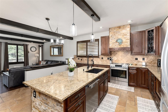 3791 Charterwood Cir, Highlands Ranch, CO 80126 - kitchen featuring stainless steel appliances, a sink, stone tile flooring, decorative backsplash, and light stone countertops