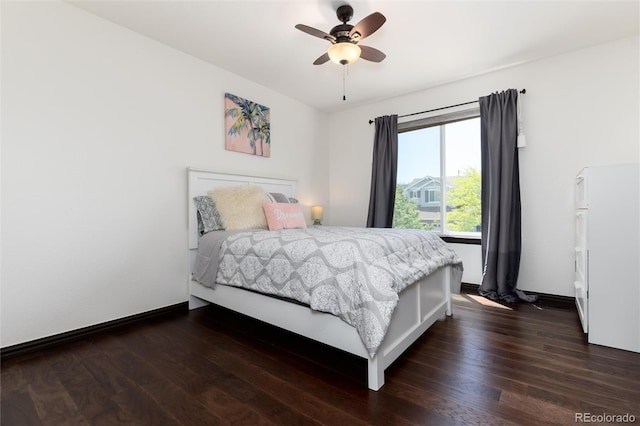 3791 Charterwood Cir, Highlands Ranch, CO 80126 - bedroom featuring dark wood-style flooring, a ceiling fan, and baseboards