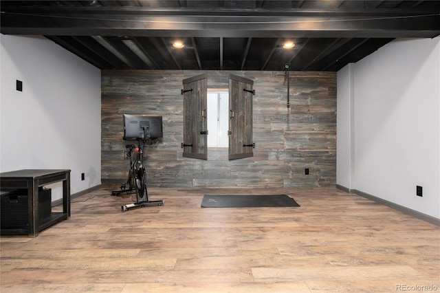 3791 Charterwood Cir, Highlands Ranch, CO 80126 - exercise room featuring wood finished floors, baseboards, and wood walls
