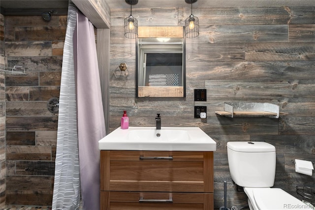 3791 Charterwood Cir, Highlands Ranch, CO 80126 - bathroom featuring vanity, toilet, and a tile shower