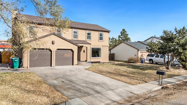 view of front of property featuring a garage