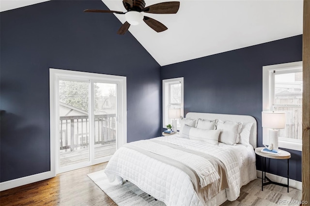4828 W 32nd Ave, Denver, CO 80212 - bedroom featuring wood finished floors, baseboards, vaulted ceiling, ceiling fan, and access to outside