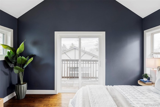 4828 W 32nd Ave, Denver, CO 80212 - bedroom featuring baseboards, access to outside, wood finished floors, and vaulted ceiling