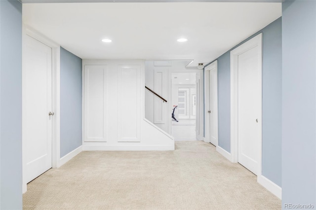 4828 W 32nd Ave, Denver, CO 80212 - below grade area featuring stairs, carpet floors, baseboards, and recessed lighting