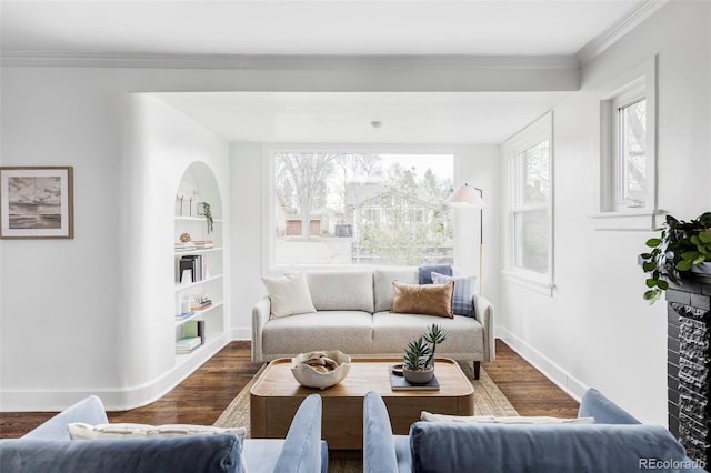 4828 W 32nd Ave, Denver, CO 80212 - living area featuring wood finished floors, baseboards, ornamental molding, and built in shelves