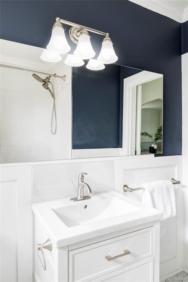 4828 W 32nd Ave, Denver, CO 80212 - bathroom featuring vanity and crown molding