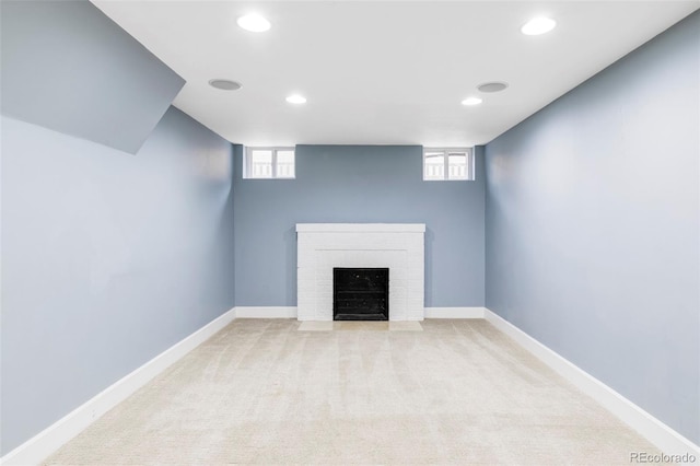 4828 W 32nd Ave, Denver, CO 80212 - unfurnished living room with light colored carpet, recessed lighting, and plenty of natural light