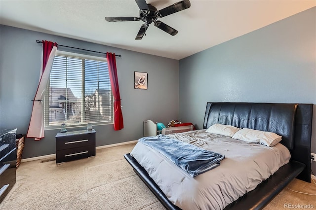 5534 Killarney St, Denver, CO 80249 - bedroom with baseboards, a ceiling fan, and carpet
