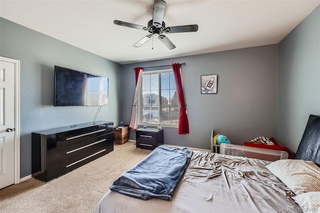 5534 Killarney St, Denver, CO 80249 - bedroom with a ceiling fan, baseboards, and carpet