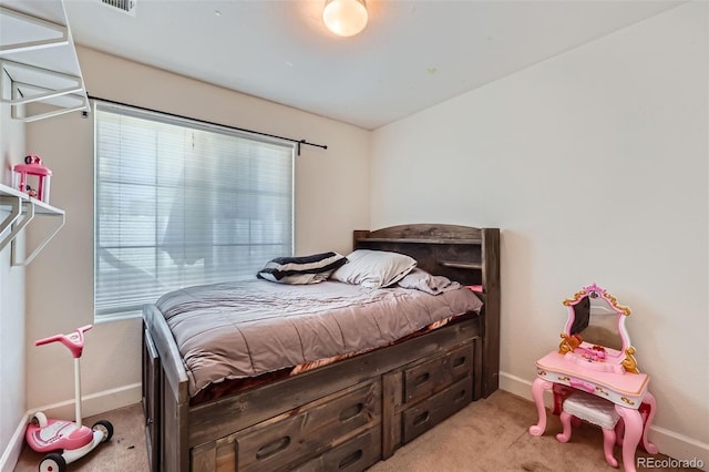 5534 Killarney St, Denver, CO 80249 - bedroom with baseboards, visible vents, and light carpet