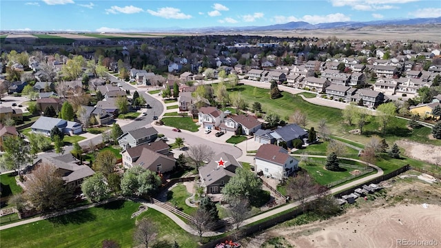 aerial view with a residential view and a mountain view