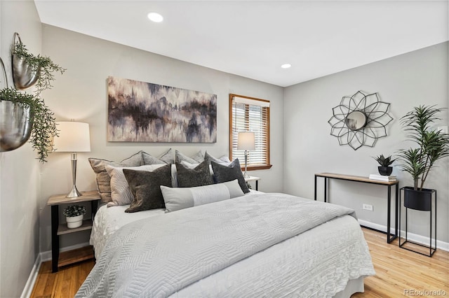 bedroom featuring hardwood / wood-style floors